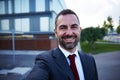 Businessman in a suit selfie