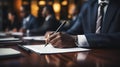 A businessman with a suit signing her signature on document, Hand Holding pen writing down or filling out on blank form paper in Royalty Free Stock Photo