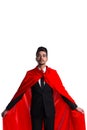 Businessman in suit and superman red cape