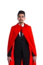 Businessman in suit and superman red cape