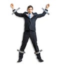 Businessman in suit is taped to the wall with adhesive tape.