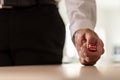 Businessman in suit throwing red dice Royalty Free Stock Photo