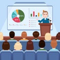 Businessman in suit and tie making presentation explaining charts on board for audience in the conference hall, business seminar,