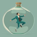 Businessman with suit trapped in a glass of jar. thinking outside the box concept Royalty Free Stock Photo