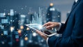 Businessman in a suit using a tablet with a futuristic cityscape and data visualization in the background with glowing lights and Royalty Free Stock Photo