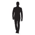 Businessman in suit walking forward, isolated vector silhouette.