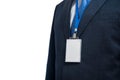 Businessman in suit wearing a blank ID tag or name card on a lanyard at an exhibition or conference Royalty Free Stock Photo