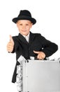 Businessman with a suitcase of money showing thumbs up Royalty Free Stock Photo