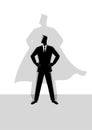 Businessman with superhero shadow