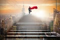 The businessman superhero successful in career ladder concept Royalty Free Stock Photo