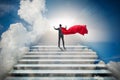 The businessman superhero successful in career ladder concept Royalty Free Stock Photo