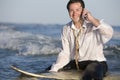 Businessman on Surfboard Royalty Free Stock Photo