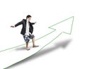 Businessman surfing on road with growth arrow