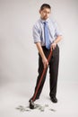 Businessman is sweeping money