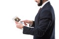 Cropped view of businessman in suit using digital tablet with depositphotos website