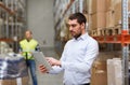 Businessman with tablet pc at warehouse Royalty Free Stock Photo