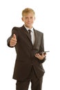 Businessman with tablet shows thumb up