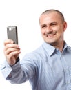Businessman taking photos with cellphone Royalty Free Stock Photo
