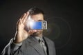 Businessman taking photos, mobile camera Royalty Free Stock Photo