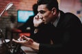 Businessman Talking on Phone on New Year Eve. Royalty Free Stock Photo