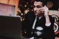 Businessman Talking on Phone on New Year Eve. Royalty Free Stock Photo