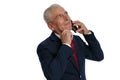 Businessman talking on the phone while scratching Royalty Free Stock Photo