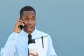 Businessman talking on the phone with surprise