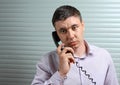 Businessman talking on telephone at office Royalty Free Stock Photo