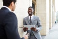 Businessman talking to the partner outdoors Royalty Free Stock Photo