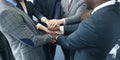 Businessman team in suit touching hands together. Selective focus. Royalty Free Stock Photo