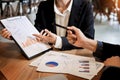 Businessman team working at office desk and using a digital comp Royalty Free Stock Photo