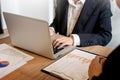 Businessman team working at office desk and using a digital comp Royalty Free Stock Photo