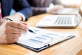 Businessman team working at office desk and using a digital comp Royalty Free Stock Photo