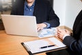 Businessman team working at office desk and using a digital computer laptop hands detail, computer and objects on the table. Royalty Free Stock Photo