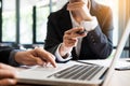 Businessman team working at office desk and using a digital comp Royalty Free Stock Photo