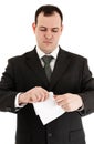 Businessman tear paper