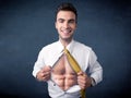 Businessman tearing off shirt and showing mucular body Royalty Free Stock Photo