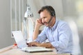 Businessman teleworking on laptop Royalty Free Stock Photo