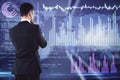 Businessman thinking on analytics data background