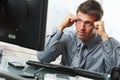 Businessman thinking at desk Royalty Free Stock Photo