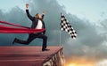 Businessman thinks she has won but there is a precipe after the finishline Royalty Free Stock Photo