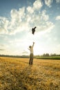 Businessman Throwing Coat in the Air at the Field Royalty Free Stock Photo