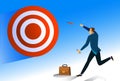 Businessman  throwing a dart on the target Royalty Free Stock Photo