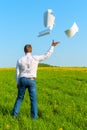 Businessman throwing documents Royalty Free Stock Photo