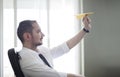 Businessman Throwing Paper Airplane Royalty Free Stock Photo