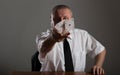 Businessman throwing playing cards. Royalty Free Stock Photo