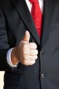 Businessman with thumb up