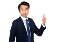 Businessman with thumb up gesture Royalty Free Stock Photo