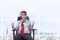 Businessman tied in rope at office Royalty Free Stock Photo