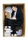 Businessman in a tight office Royalty Free Stock Photo